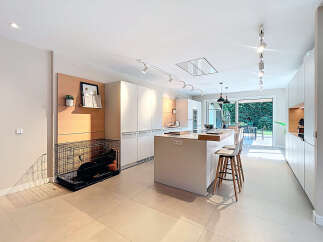Modern kitchen design with sleek white cabinetry and a spacious island.