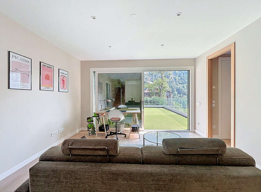 This stunning property boasts a modern living space with a seamless connection to the outdoors.