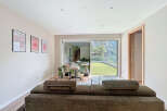 This stunning property boasts a modern living space with a seamless connection to the outdoors.