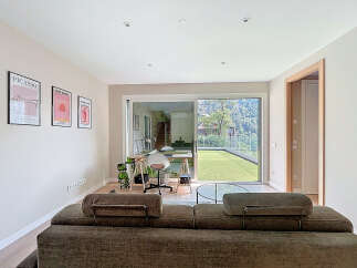 This stunning property boasts a modern living space with a seamless connection to the outdoors.