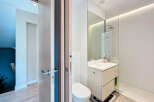 Step into a modern oasis with this stunning bathroom.