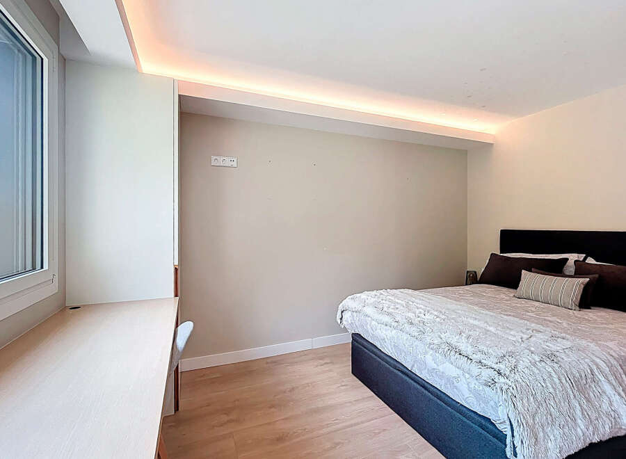 Discover a serene bedroom retreat with modern design.