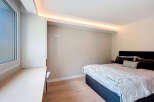 Discover a serene bedroom retreat with modern design.