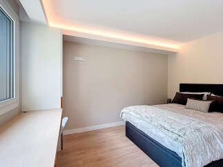 Discover a serene bedroom retreat with modern design.