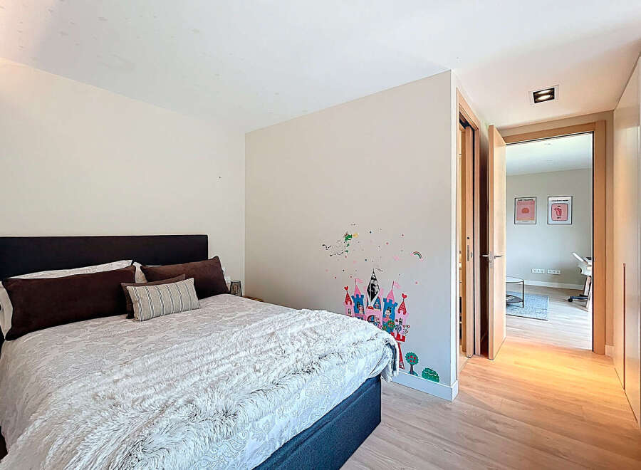 Discover a cozy bedroom with a touch of charm.