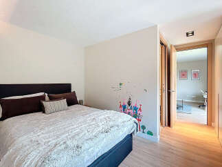 Discover a cozy bedroom with a touch of charm.