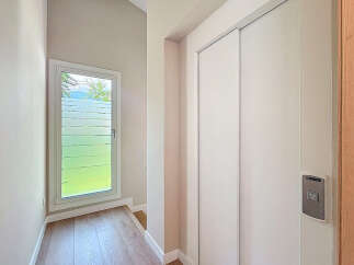 Discover a modern interior with a sleek elevator, perfect for easy access.