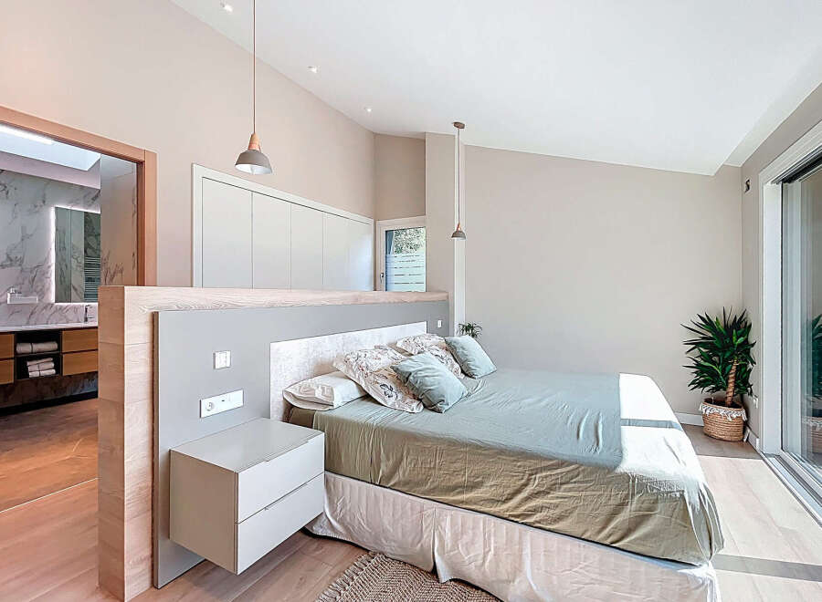 Discover a serene bedroom retreat with a modern design.
