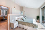 Discover a serene bedroom retreat with a modern design.