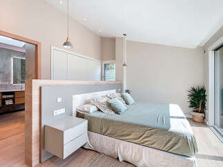 Discover a serene bedroom retreat with a modern design.