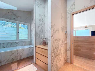 Step into a luxurious bathroom retreat.