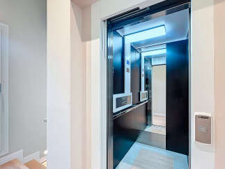 Step into luxury with this stunning property featuring a modern elevator.
