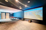 Step into luxury with this stunning home theater! Enjoy movie nights on a massive screen with immersive sound.