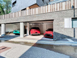 Discover modern luxury in this stunning property featuring a multi-car garage.
