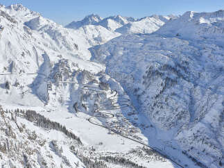 Experience the breathtaking beauty of the snow-covered mountains.