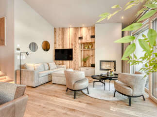 This stunning living room showcases a modern design with a cozy ambiance.