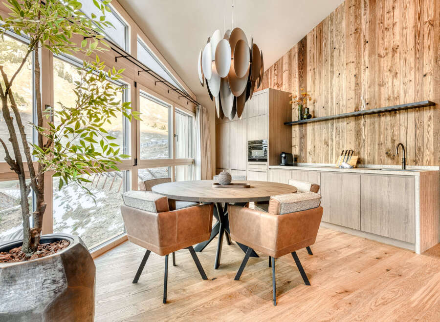 This stunning property boasts a modern kitchen and dining area, perfect for entertaining.