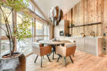 This stunning property boasts a modern kitchen and dining area, perfect for entertaining.