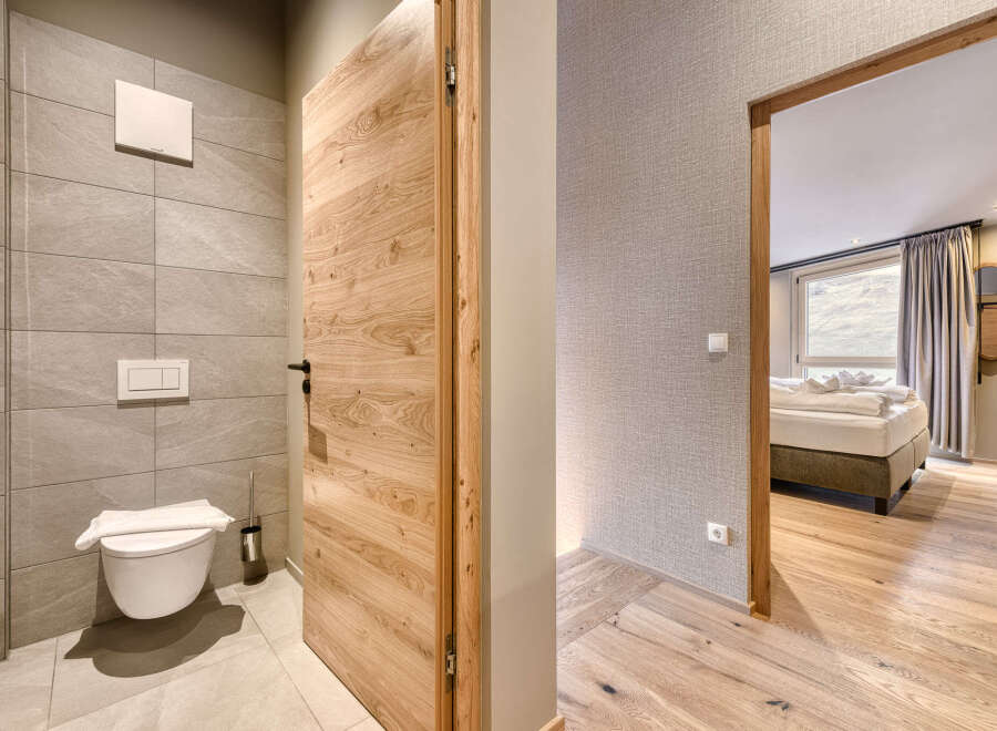 Step into a beautifully designed bathroom featuring modern amenities and a touch of elegance.