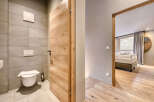 Step into a beautifully designed bathroom featuring modern amenities and a touch of elegance.