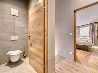 Step into a beautifully designed bathroom featuring modern amenities and a touch of elegance.