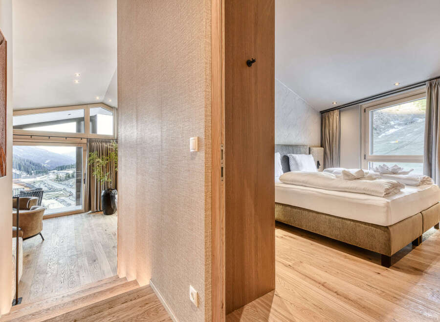 Step into luxury with this stunning property featuring a modern bedroom and a spacious living area.