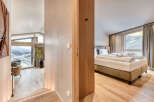 Step into luxury with this stunning property featuring a modern bedroom and a spacious living area.