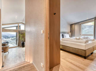 Step into luxury with this stunning property featuring a modern bedroom and a spacious living area.