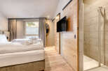 Experience luxury and comfort in this stunning bedroom.