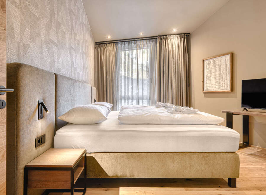 Experience luxury and comfort in this beautifully designed bedroom.
