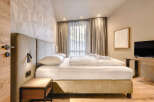 Experience luxury and comfort in this beautifully designed bedroom.