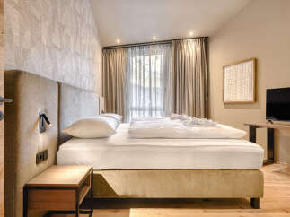 Experience luxury and comfort in this beautifully designed bedroom.