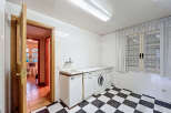 Discover this charming property featuring a well-equipped laundry room.