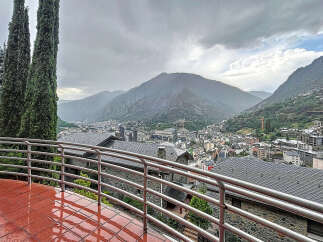 Enjoy breathtaking views of the city and mountains from this stunning property.