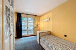 Discover a cozy bedroom with a charming ambiance.