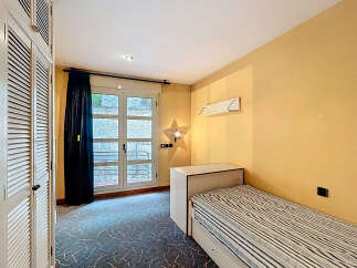 Discover a cozy bedroom with a charming ambiance.