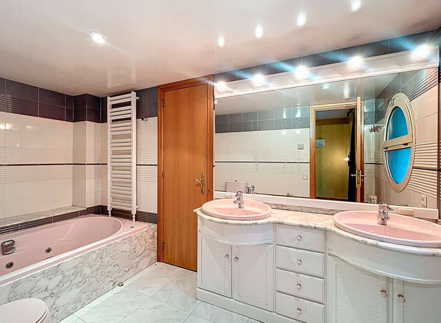 Discover a luxurious bathroom with a spa-like ambiance.