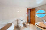 Discover a bright and airy bathroom with stunning views.