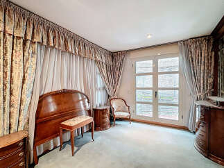Elegant bedroom with classic design.