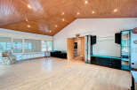 Discover this stunning property featuring a unique wooden ceiling and ample natural light.