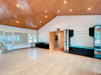 Discover this stunning property featuring a unique wooden ceiling and ample natural light.