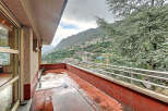 Enjoy breathtaking mountain views from this stunning balcony.