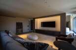 This stylish living room features a neutral color palette, creating a calming atmosphere.