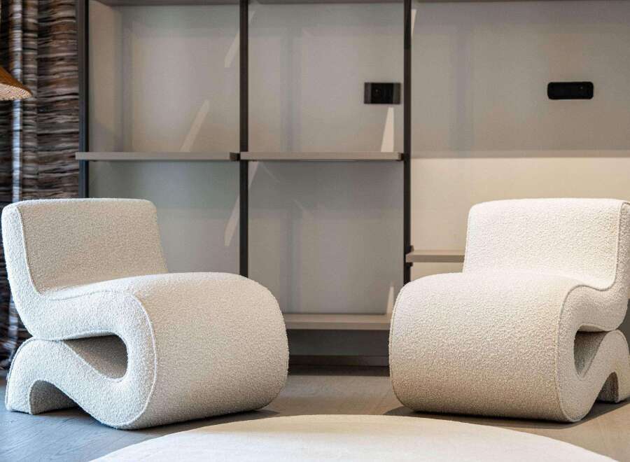 Elevate your living space with these stylish, modern accent chairs, perfect for creating a cozy and inviting atmosphere in any home.