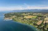 Discover luxury lakeside living with this stunning aerial view of waterfront homes.