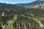 Nestled among towering pines, this luxury property offers privacy and stunning views.