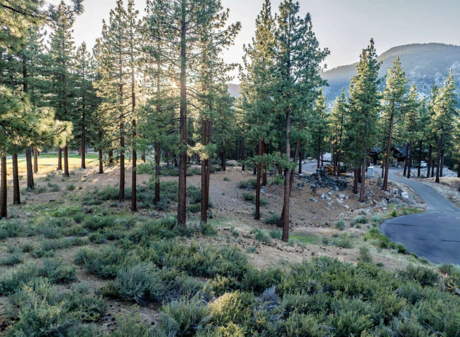 This scenic property offers a harmonious blend of nature and convenience.