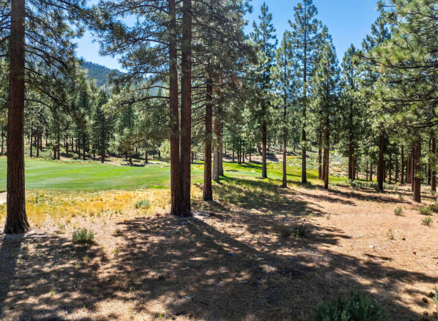 Discover the perfect blend of nature and luxury with this property backing onto a lush golf course.
