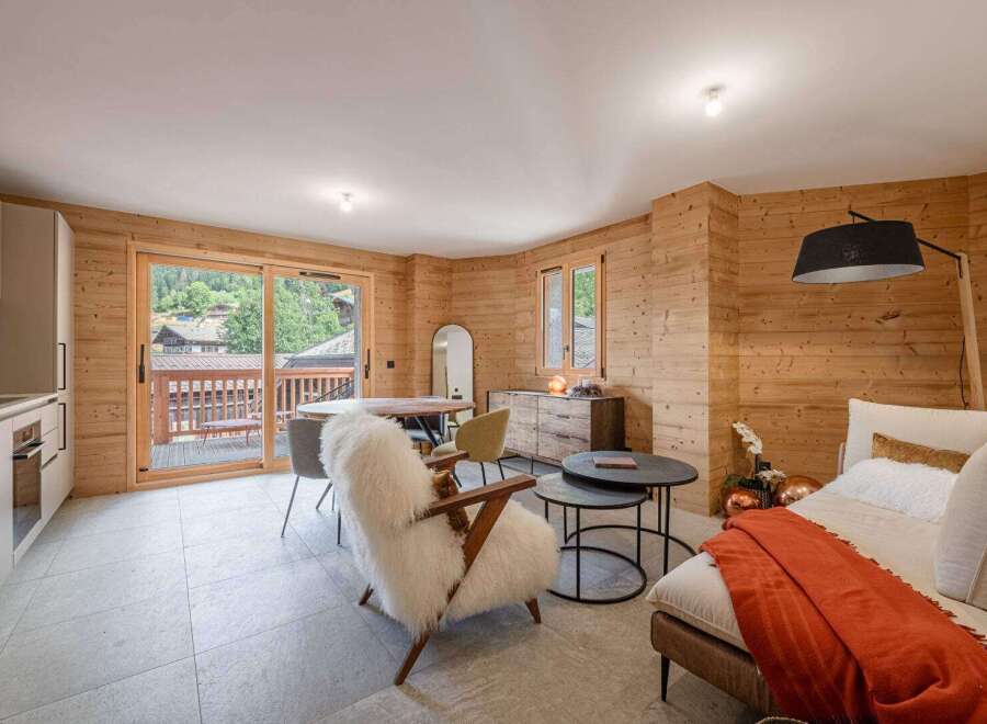 Experience the epitome of alpine living in this stunning property, boasting a seamless blend of modern design and rustic charm.
