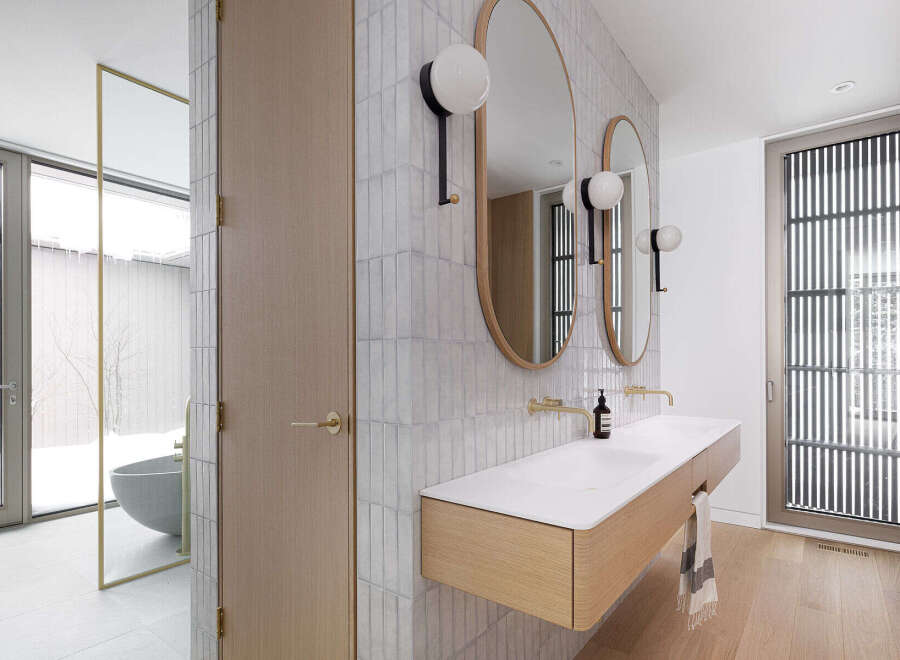 This stunning bathroom boasts a modern design with sleek, minimalist features.